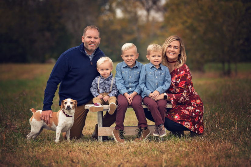 family of 5 with 3 boys and a dog